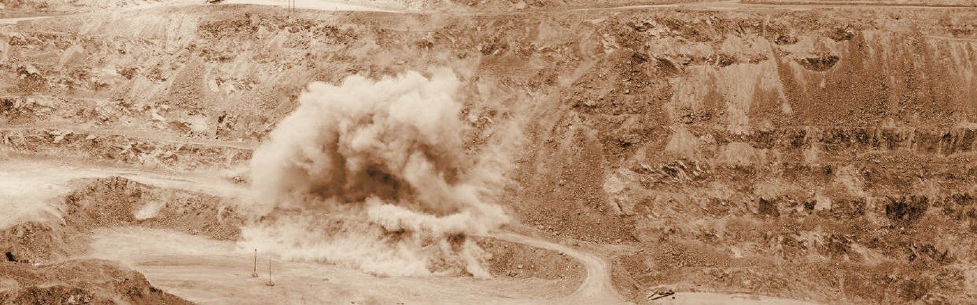 Blasting operations at an open-pit mine